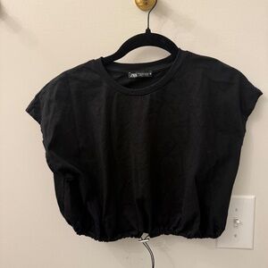 Cap sleeve cropped t-shirt with adjustable bottom